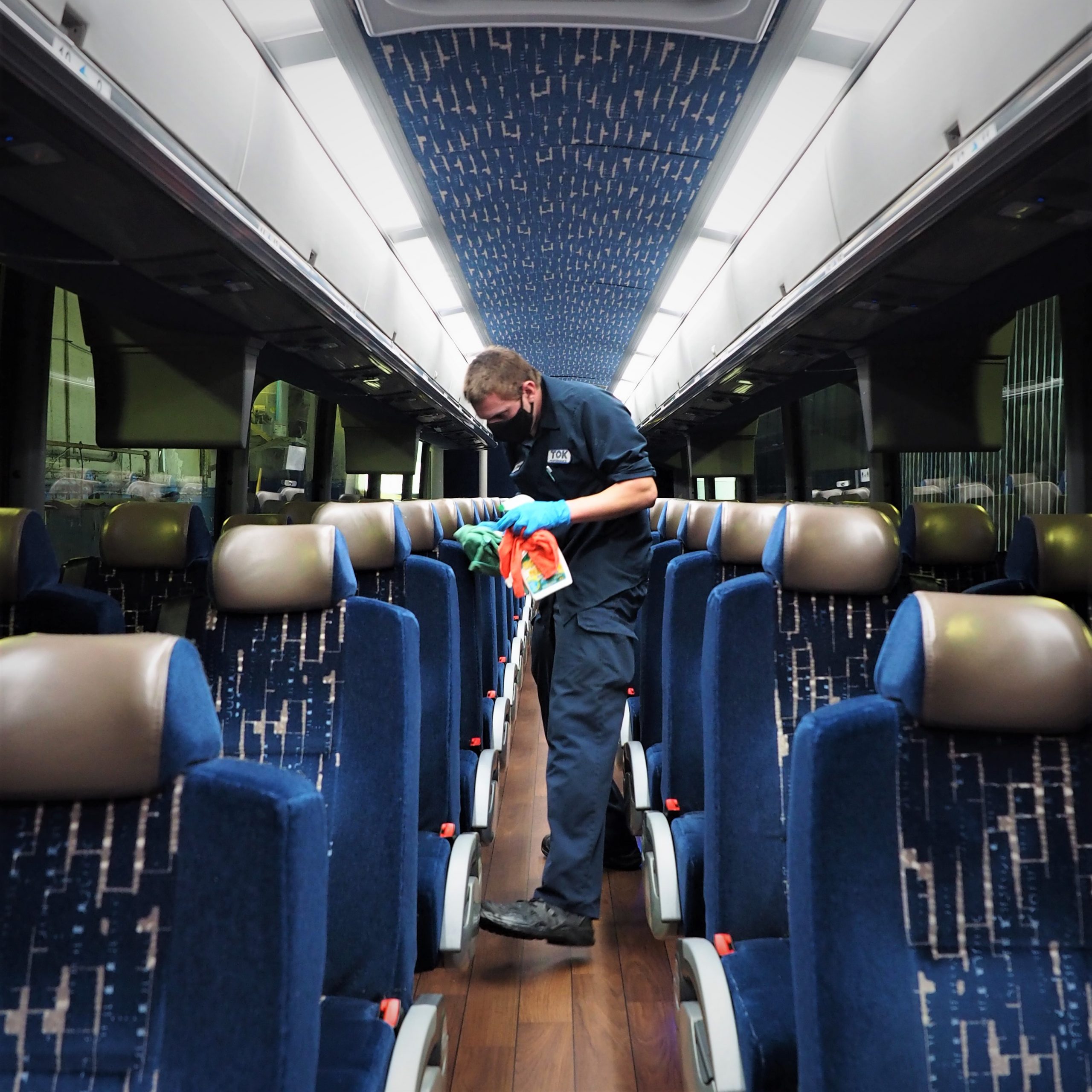 Employee cleaning the bus
